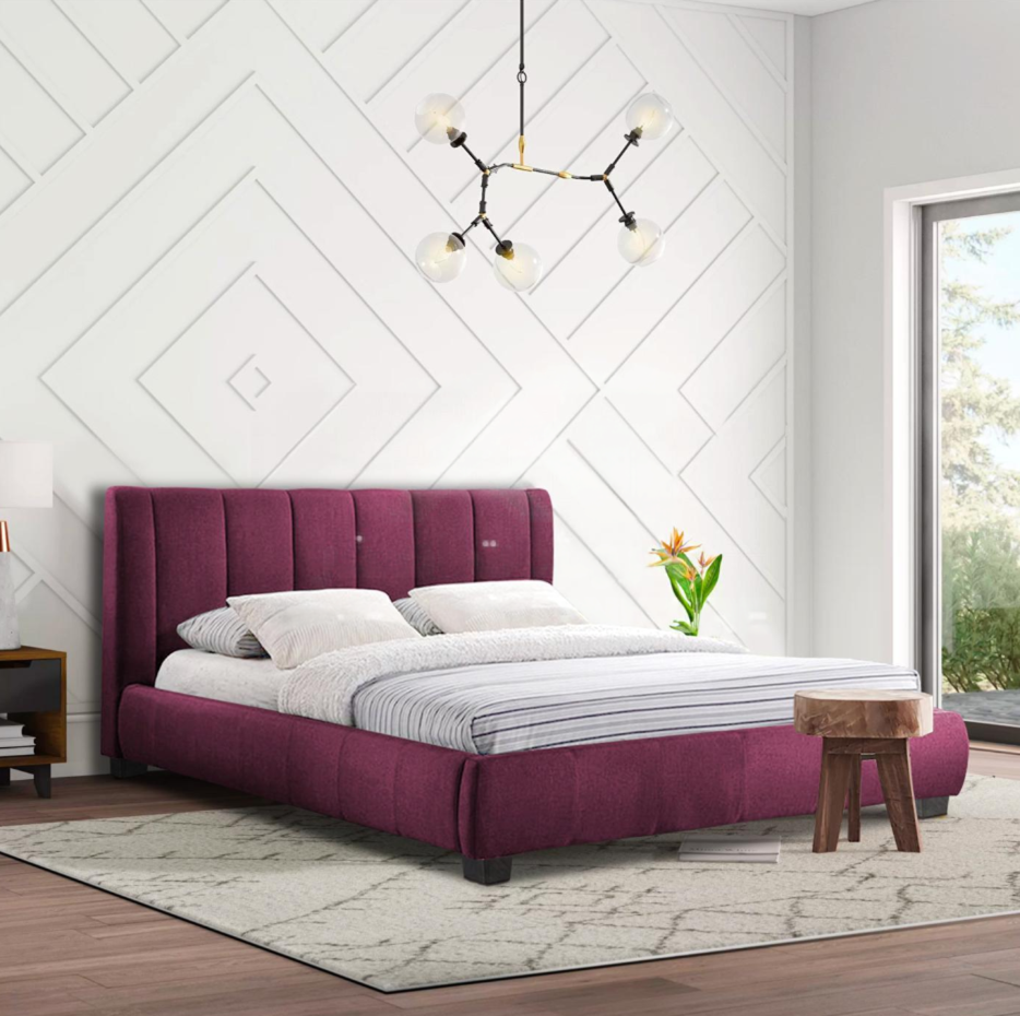 A bold purple bed with vertical channel tufting on the headboard and footboard, set on a textured white wall.